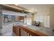 Spacious garage with open door, storage cabinets, and ramp access at 403 Pebblebrooke Ln, Canton, GA 30115