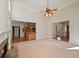 Open floor plan living room with a fireplace and kitchen view at 403 Pebblebrooke Ln, Canton, GA 30115