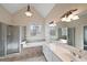 Main bathroom with double vanity, jetted tub, and separate shower at 403 Pebblebrooke Ln, Canton, GA 30115