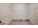 Large walk-in closet with wire shelving for ample storage at 403 Pebblebrooke Ln, Canton, GA 30115