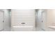 Spa-like bathroom with a freestanding tub and marble flooring at 6175 River Shore Pkwy, Atlanta, GA 30328