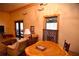 Relaxing living room with a wood-top game table and French doors at 1625 Brushy Mountain Rd, Rockmart, GA 30153
