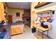 Open kitchen features a large island and views into adjacent living area at 1625 Brushy Mountain Rd, Rockmart, GA 30153