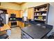 L-shaped kitchen with stainless steel appliances and granite countertops at 1625 Brushy Mountain Rd, Rockmart, GA 30153