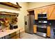 Kitchen boasts stainless steel appliances and a wood butcher block at 1625 Brushy Mountain Rd, Rockmart, GA 30153