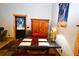 Rustic dining area with a unique wooden table and deer-themed decor at 1625 Brushy Mountain Rd, Rockmart, GA 30153