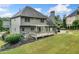 Gray two-story home with deck and landscaped backyard at 719 Settlers Xing, Canton, GA 30114