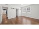 Bright bedroom with hardwood floors and barn door at 58 Peachtree Memorial Nw Dr # 1, Atlanta, GA 30309