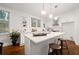 Modern kitchen with white cabinets and quartz countertops at 58 Peachtree Memorial Nw Dr # 1, Atlanta, GA 30309