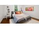 Charming bedroom with hardwood floors, a cozy bed, and colorful decor at 58 Peachtree Memorial Nw Dr # 1, Atlanta, GA 30309