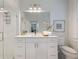 Modern bathroom with white vanity, a large mirror, and a walk-in shower at 58 Peachtree Memorial Nw Dr # 1, Atlanta, GA 30309