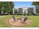 Apartment building with firepit and seating area in the courtyard at 58 Peachtree Memorial Nw Dr # 1, Atlanta, GA 30309