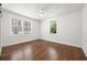 Spacious bedroom featuring hardwood floors and ample natural light at 58 Peachtree Memorial Nw Dr # 1, Atlanta, GA 30309