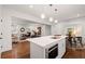 Open concept kitchen with island and microwave at 58 Peachtree Memorial Nw Dr # 1, Atlanta, GA 30309