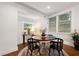 Charming dining area with round table and four chairs at 58 Peachtree Memorial Nw Dr # 1, Atlanta, GA 30309