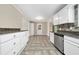 Modern kitchen with granite countertops and stainless steel appliances at 1870 Rocksram Dr, Buford, GA 30519