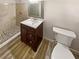 Updated bathroom with a walk-in shower and new vanity at 741 Prince Ave, Marietta, GA 30062