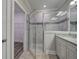Double vanity bathroom with granite countertop and walk-in shower at 111 Sunflower Ne Cir, Cartersville, GA 30121