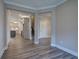 Open dining area with wood-look floors and kitchen access at 111 Sunflower Ne Cir, Cartersville, GA 30121