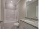 Bathroom with shower/tub combo, granite vanity and white toilet at 111 Sunflower Ne Cir, Cartersville, GA 30121