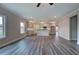 Open living space with hardwood floors and kitchen view at 111 Sunflower Ne Cir, Cartersville, GA 30121