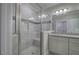 Walk-in shower with marble tile and built-in seat at 111 Sunflower Ne Cir, Cartersville, GA 30121