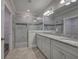 Bathroom boasts double vanity, granite countertop, and a large shower at 111 Sunflower Ne Cir, Cartersville, GA 30121