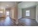 Bright foyer with wood-look floors and access to other rooms at 111 Sunflower Ne Cir, Cartersville, GA 30121