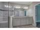 Double vanity bathroom with granite countertop and walk-in shower at 111 Sunflower Ne Cir, Cartersville, GA 30121
