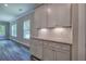 Modern kitchen features granite countertops and shaker-style cabinets at 111 Sunflower Ne Cir, Cartersville, GA 30121