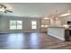 Open concept living room and kitchen area with hardwood floors at 111 Sunflower Ne Cir, Cartersville, GA 30121