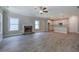 Open concept kitchen and living area with hardwood floors and island at 109 Sunflower Ne Cir, Cartersville, GA 30121