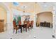 Formal dining room with large windows, chandelier and hardwood floors at 3135 Juhan Rd, Stone Mountain, GA 30087