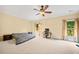 Spacious bedroom with large windows, ceiling fan and workspace at 3135 Juhan Rd, Stone Mountain, GA 30087
