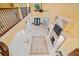 Two-story living room with tile flooring and a fireplace at 3135 Juhan Rd, Stone Mountain, GA 30087