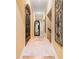 Elegant hallway with arched entryways and ornate iron gates at 3135 Juhan Rd, Stone Mountain, GA 30087