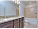 Bathroom with granite countertops and tile shower/tub at 6194 Ripple Way # 86, South Fulton, GA 30349