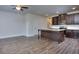 Open floor plan with kitchen island and hardwood floors at 6194 Ripple Way # 86, South Fulton, GA 30349