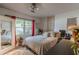 Cozy bedroom with a queen bed and large windows at 217 Maple Nw St, Atlanta, GA 30314