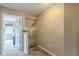 Upper hallway with carpet, doors to bedrooms, and stairway at 217 Maple Nw St, Atlanta, GA 30314