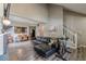 Spacious living room with L-shaped sectional sofa, fireplace and high ceilings at 217 Maple Nw St, Atlanta, GA 30314