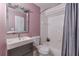 Clean bathroom with a bathtub, toilet, and vanity at 217 Maple Nw St, Atlanta, GA 30314