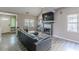 Bright living room with sectional sofa, fireplace and hardwood floors at 217 Maple Nw St, Atlanta, GA 30314