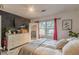 Bright bedroom with a queen bed and chalkboard wall at 217 Maple Nw St, Atlanta, GA 30314