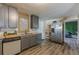 Updated kitchen with gray cabinets, granite countertops and stainless steel appliances at 217 Maple Nw St, Atlanta, GA 30314