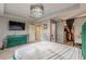 Bright bedroom with a large bed, walk-in closet, and ensuite bathroom at 217 Maple Nw St, Atlanta, GA 30314