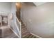 Carpeted staircase with white railing at 217 Maple Nw St, Atlanta, GA 30314