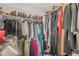 Well-organized walk-in closet with clothing and shoes at 217 Maple Nw St, Atlanta, GA 30314