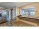 Kitchen features granite countertops and a pass-through to the living room at 217 Maple Nw St, Atlanta, GA 30314