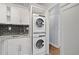 Stackable washer and dryer in a convenient kitchen alcove at 3060 Pharr Court North Nw # 317, Atlanta, GA 30305